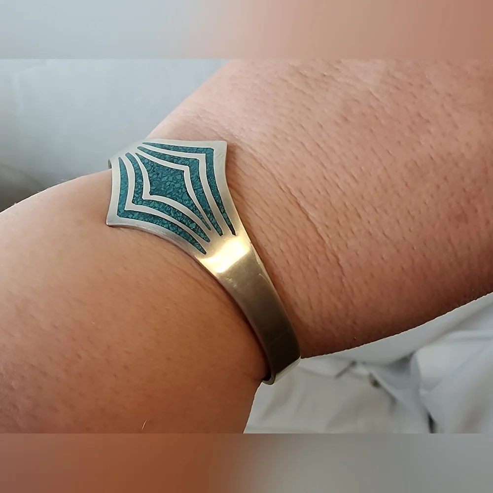 Vintage Sterling Silver Taxco Cuff Bracelet with turquoise inlay.